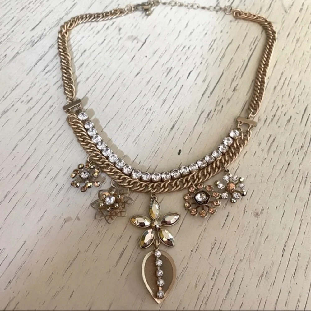 Gold Tone Necklace with Rhinestones and Flower Charms